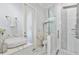 Modern bathroom boasts a glass-enclosed shower and stylish vanity, creating a spa-like atmosphere at 1450 Belfiore Way, Windermere, FL 34786