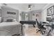 Bedroom with a covered pool table, modern desk area, bed, and neutral-toned walls at 1450 Belfiore Way, Windermere, FL 34786