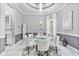 Formal dining room featuring a round table with seating for six at 1450 Belfiore Way, Windermere, FL 34786