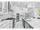Modern kitchen with stainless steel appliances and a spacious island at 1450 Belfiore Way, Windermere, FL 34786