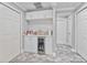 Well-equipped kitchenette features sleek cabinets, a beverage cooler, and stylish backsplash, perfect for entertaining at 1450 Belfiore Way, Windermere, FL 34786
