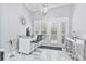 Stylish bar area with modern fixtures, ample seating, and elegant decor perfect for entertaining guests at 1450 Belfiore Way, Windermere, FL 34786