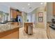 Modern kitchen featuring granite countertops, stainless steel appliances, and a convenient center island at 16313 Birchwood Way, Orlando, FL 32828
