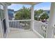 Private balcony featuring sturdy columns and railings, providing an inviting outdoor living area with scenic views at 171 Mcleods Way, Winter Springs, FL 32708