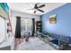 Cozy bedroom featuring a crib and a window with natural light, perfect for a  at 171 Mcleods Way, Winter Springs, FL 32708