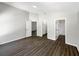 Spacious bedroom featuring waterproof vinyl flooring and multiple closets and ensuite bathroom at 17505 Silver Creek Ct, Clermont, FL 34714