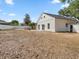Expansive backyard featuring ample space and a home with neutral color palette at 1862 Spreakley Ct, Orlando, FL 32837