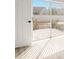 View through a patio door, showcasing a fenced backyard with a patio at 1862 Spreakley Ct, Orlando, FL 32837