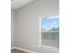 Bedroom with a window and grey walls at 1862 Spreakley Ct, Orlando, FL 32837