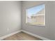 Corner bedroom features a window, light grey walls, and neutral flooring at 1862 Spreakley Ct, Orlando, FL 32837