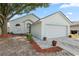 Charming single-Gathering home with well-maintained landscaping and a two-car garage at 1862 Spreakley Ct, Orlando, FL 32837