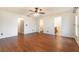 A spacious bedroom boasting beautiful floors, with easy access to closet and bathroom, offering a comfortable living space at 21529 Prince Albert Ct, Leesburg, FL 34748