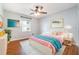 Cozy bedroom with bright accents and ample natural light at 21529 Prince Albert Ct, Leesburg, FL 34748
