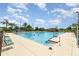 Outdoor swimming pool with lounge chairs, providing a perfect setting for relaxation and recreation at 21529 Prince Albert Ct, Leesburg, FL 34748