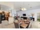 Open concept with kitchen, dining, and living area at 235 Hollingshead Loop, Davenport, FL 33896
