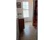 Spacious bathroom with tiled floors, single sink vanity and a view from the door at 25618 Fishermans Rd, Paisley, FL 32767