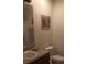 Bathroom featuring single vanity sink and neutral colored walls at 25618 Fishermans Rd, Paisley, FL 32767