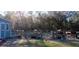 Property featuring a fenced pasture area with horses and a small shed at 25618 Fishermans Rd, Paisley, FL 32767
