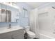 Recently remodeled bathroom features a vanity with sink and a shower over tub at 2935 Arcata Ln, Orlando, FL 32817