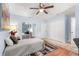 Bedroom with mirrored closet doors and a view into a second office space at 2935 Arcata Ln, Orlando, FL 32817