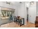 Cozy dining area with view to screened porch through glass sliding doors at 2935 Arcata Ln, Orlando, FL 32817
