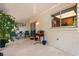 Covered patio with a view to the home's exterior and lush backyard greenery at 2935 Arcata Ln, Orlando, FL 32817