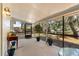 Covered and screened patio with views of the backyard and mature shade trees at 2935 Arcata Ln, Orlando, FL 32817