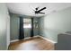 Comfortable bedroom with natural light, ceiling fan, and neutral paint at 307 Coble Dr, Longwood, FL 32779