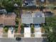 Aerial view of the property showcasing solar panels and the surrounding community at 3154 Stonecastle Rd, Orlando, FL 32822