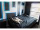 Bedroom featuring bright window and unique framed wall decorations, perfect for a modern look at 3154 Stonecastle Rd, Orlando, FL 32822