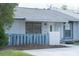 Charming single-story home with a gray roof and a small, fenced front yard at 3154 Stonecastle Rd, Orlando, FL 32822