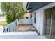 Side patio area featuring sliding glass doors and a small, gravel-covered space at 3154 Stonecastle Rd, Orlando, FL 32822