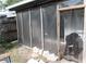 View of the enclosed patio with access to the backyard and sliding glass door to the home at 3154 Stonecastle Rd, Orlando, FL 32822