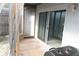 View of screened in patio featuring access to backyard through sliding glass door at 3154 Stonecastle Rd, Orlando, FL 32822