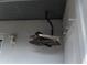 Overhead storage on the screened in patio. Includes a light fixture at 3154 Stonecastle Rd, Orlando, FL 32822