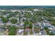An aerial view of a home surrounded by mature trees at 3199 Tobago Ct, Apopka, FL 32703