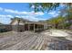 Exterior shot of a home's backyard featuring a pool and screened-in enclosure at 3199 Tobago Ct, Apopka, FL 32703
