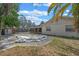 A home's exterior backyard features a pool with an adjacent shed at 3199 Tobago Ct, Apopka, FL 32703