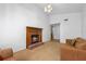 Cozy living room area features a fireplace at 3199 Tobago Ct, Apopka, FL 32703