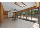 Pool room features lots of natural light and a ceiling fan at 3199 Tobago Ct, Apopka, FL 32703