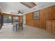 Bright sunroom that has a ceiling fan, and views of the backyard and pool at 3199 Tobago Ct, Apopka, FL 32703