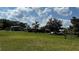 Exterior view of the house with an oversized grassy lawn at 4170 Packard Ave, St Cloud, FL 34772