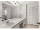 Bright bathroom featuring double sinks and spacious vanity at 4232 Sandhurst Dr, Orlando, FL 32817