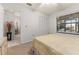 Cozy bedroom with a double bed, closet and natural light from a window at 4232 Sandhurst Dr, Orlando, FL 32817