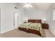 Bedroom featuring a ceiling fan, carpeted floors and two beds at 4232 Sandhurst Dr, Orlando, FL 32817