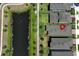 An aerial view shows the home with a private backyard and pond at 4548 Dulwik Pl, Sanford, FL 32771