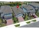 An aerial view showcases this single Gathering home with brick drive and manicured front yard at 4548 Dulwik Pl, Sanford, FL 32771