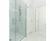 Bathroom features a large marble shower with glass door and marble floors at 4548 Dulwik Pl, Sanford, FL 32771