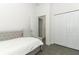 Bedroom with hardwood floors, a comfortable bed, and closet space at 4548 Dulwik Pl, Sanford, FL 32771