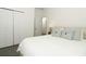 Bright bedroom featuring closet space, hardwood floors and a comfortable bed at 4548 Dulwik Pl, Sanford, FL 32771